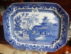 A blue and white willow pattern teapot,