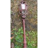 An old Victorian cast iron lamp