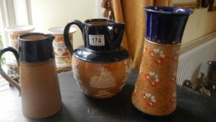 2 Royal Doulton stoneware jugs and a vase.