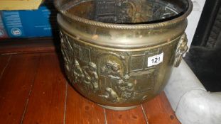 A Victorian brass coal bucket