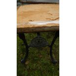 An old cast aluminium triple legged table - top a/f