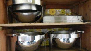 Three large warmers and a bain marie