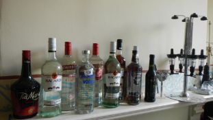 A quantity of bottles of alcohol including Bacardi x 2,