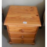 A pine 3 drawer bedside.