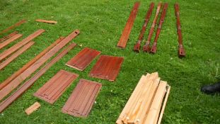 A mahogany four poster bed (in pieces for assembly)