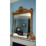 A large gilt framed mirror