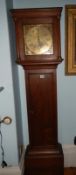 An oak long case 30 hour clock with brass dial marked Wm. Harris, Chippenham.