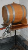 A large oak beer barrel with tap