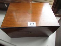 A mahogany writing box.