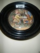 A rare framed Pratt ware pot lid,