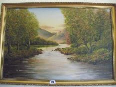 A gilt framed oil on canvas River with Moutains signed W.