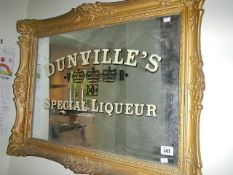 A Dunville's Special Liqueur mirror.