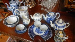 A mixed lot of blue and white including oriental teapot, Delft teapot etc.