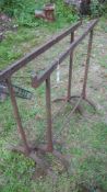 A pair of iron trestles