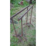 A pair of iron trestles