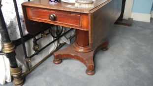 A Victorian Pembroke table with drawer