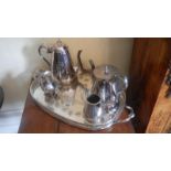 A 4 piece silver plate tea set on tray.