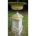 A large urn on plinth