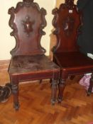 Two old wooden carved chairs