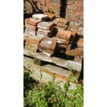 A quantity of terracotta floor tiles approx 6" x 6" x 2" (on palette)