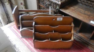 2 oak letter racks and a book rest.