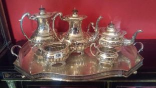 A fine silver tea and coffee service comprising teapot, water jug, coffee pot,