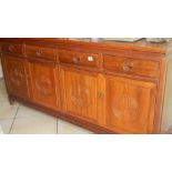 A large teak sideboard