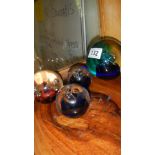 4 glass paperweights including Caithness and medicine bottles etc.