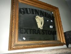A Guinness extra stout mirror.
