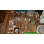 A large quantity of glass ware including jelly moulds, paperweights, cake stands etc.