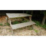 A double seat wooden garden table