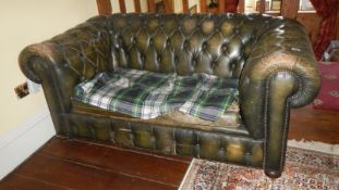 A two seater leather settee