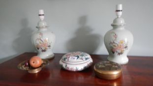 A quantity of pottery including a pair of lamp bases