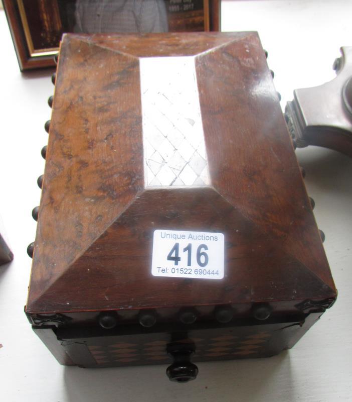 An unusual box with drawer and parquetry inlay.