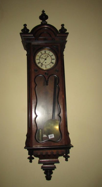A Victorian mahogany single weight Vienna wall clock.