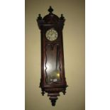 A Victorian mahogany single weight Vienna wall clock.