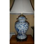 A pair of blue and white side table lamps