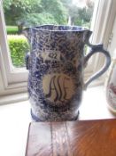 A large blue and white pottery jug.