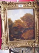 An oil on board Forest River in ornate gilt frame - no signature visible (image 24cm x 29cm,