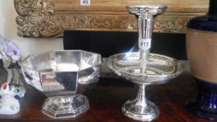A silver plate bowl and a silver plate table centrepiece.