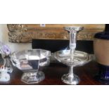 A silver plate bowl and a silver plate table centrepiece.