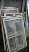 A quantity of sash windows some with fittings