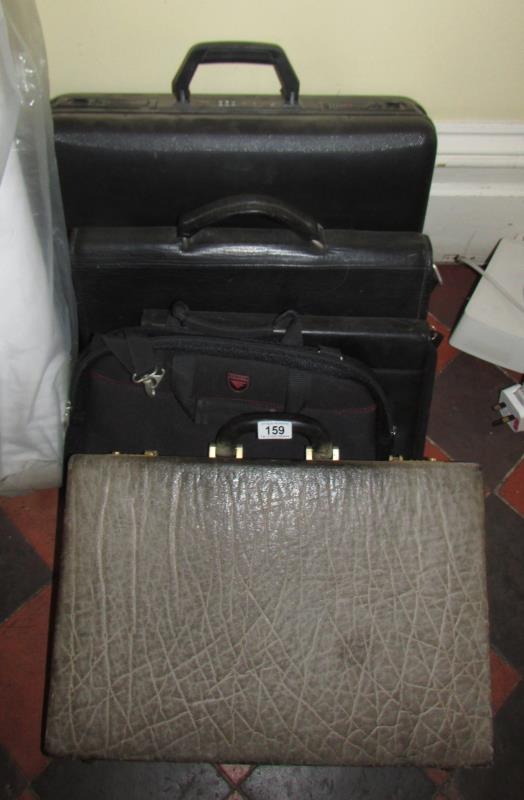 An elephant hide case and other cases