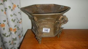 A bronze pot,