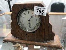 A Smith's car clock in oak case.