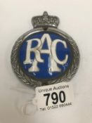 A heavy enamel RAC car badge.