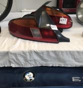 A 1999 BMW Z3 bonnet, boot, rear lights and rear bumper.