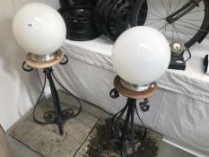 A pair of post gate lamps.