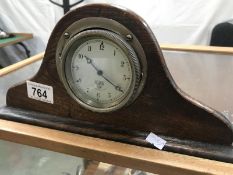 A Smith's car clock in oak case.