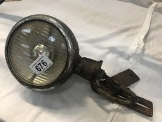 A Vauxhall driving light with unusual Lucas style Vauxhall England medallion.
